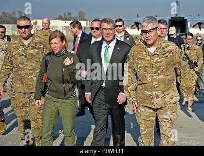 Jalalabad, Afghanistan. 18th Dec, 2015. US Secretary of Defense Ashton Carter and his wife Stephanie walk with Commander of U.S. Forces Gen. John Campbell during a surprise visit to Forward Operating Base Fenty December 18, 2015 in Jalalabad, Afghanistan. Stock Photo