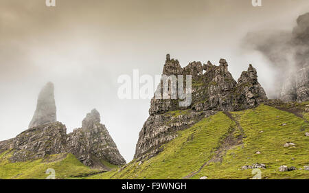 Misty Storr pinnacles on the Isle of Skye in Scotland. Stock Photo