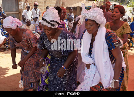 Ewe women participating in a Tron vodun (voodoo) ceremony, Lome, Togo Stock Photo