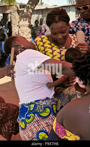 Ewe people participating in a Tron vodun (voodoo) ceremony, Lome, Togo Stock Photo