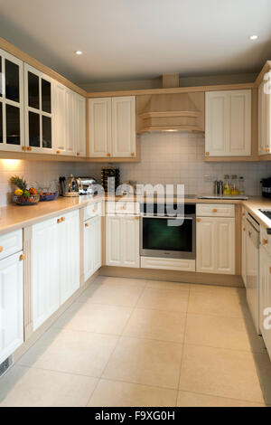 Small upmarket fitted kitchen. Stock Photo