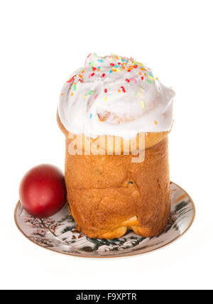 Easter cake with glace icing and easter eggs on white background Stock Photo