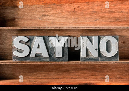 say no phrase made from metallic letterpress type on wooden tray Stock Photo