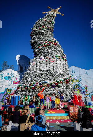 (151219)-- HOLLYWOOD, Dec. 19, 2015(Xinhua)-- The towering 'Grinchmas' tree is seen at the Universal Studios Hollywood theme park in Los Angels, California of the United States, on Dec. 19, 2015. The theme park started a 'Crinchmas' celebration for upcoming Christmas and New Year from Dec. 18 to Jan. 3, 2016. The Grinch came from 'How the Grinch Stole Christmas' which was written by famous American children's book writer Dr. Seuss and later made into a Universal movie with the same title in 2000. (Xinhua/Zhang Chaoqun)(azp) Stock Photo
