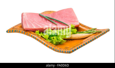 Tuna raw steak with asparagus and salad Stock Photo