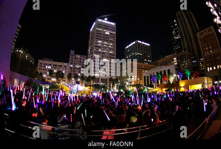 Los Angeles, California, USA. 18th Dec, 2015. A lightsaber battle takes place in Los Angeles Friday night, where thousands of ''Star Wars'' fans gathered to set a world record.Fans were dressed as fighters from the ''Jedi'' side and the ''dark'' side during the friendly fight at Pershing Square down town Los Angeles.The record was set for the world's largest lightsaber battle over 24 hours and was aided by participating cities in San Diego, San Francisco and Seattle.The light saber battle coincided with the opening of Star Wars The Force Awakens and the two day event was put on by Newmindspace Stock Photo