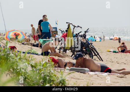 PALANGA, LITHUANIA - AUGUST 02: Affluence of holidaymakers to Palanga beach on August 02, 2015 in Palanga, Lithuania. About 1 mi Stock Photo