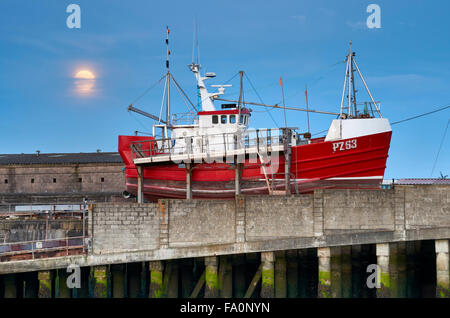 Fishing boat having maintenance and a repaint, Newlyn Stock Photo