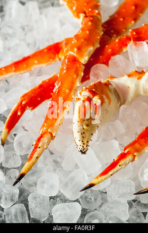 Cooked Organic Alaskan King Crab Legs with Butter Stock Photo