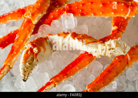 Cooked Organic Alaskan King Crab Legs with Butter Stock Photo