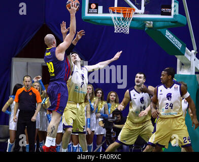 KYIV, UKRAINE - NOVEMBER 14, 2013: Budivelnik Kyiv (in Yellow) and FC Barcelona players fight for a ball during their Turkish Ai Stock Photo