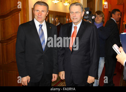 KYIV, UKRAINE - DECEMBER 17, 2010: President of National Olympic Committee of Ukraine Serhiy Bubka (L) and President of Internat Stock Photo