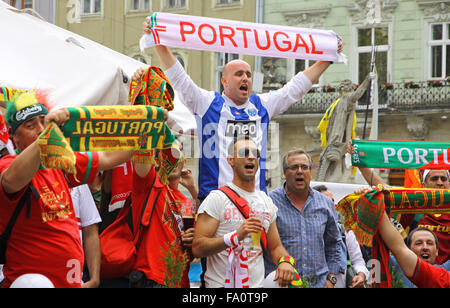 LVIV, UKRAINE - JUNE 9, 2012: Portugal football team supporters walk on a streets of Lviv city before UEFA EURO 2012 game agains Stock Photo