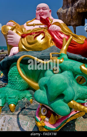 Colourful Buddha and Dragon. Khao Takiab Hua Hin Thailand S. E. Asia Stock Photo