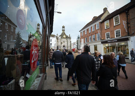 Christmas shoppers in East Street, Chichester, West Sussex, England do some last minute shopping on the last Saturday before Christmas day. Stock Photo