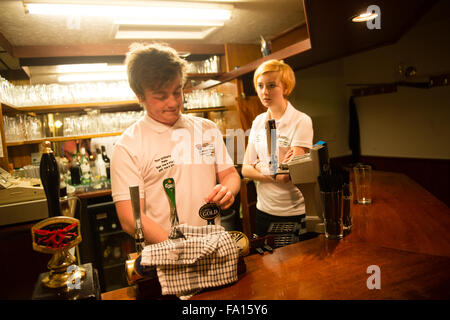 University undergraduate theatre studies student actors performing a site-specific production of the play  'Two' by Jim Cartwright, on location in the bar room of the  Coopers Arms pub, Aberystwyth Wales UK Stock Photo