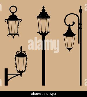 Black lanterns isolated on beige Stock Vector