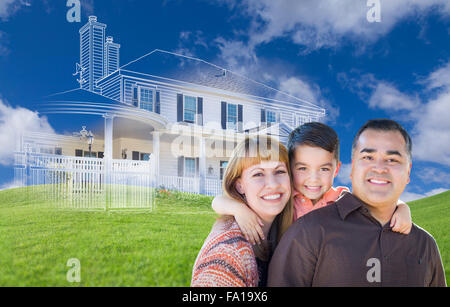 Young Happy Mixed Race Family and Ghosted House Drawing on Grass. Stock Photo