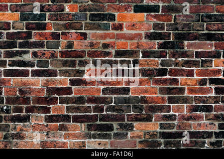 Red old clay brick wall damaged and weathered empty background texture Stock Photo