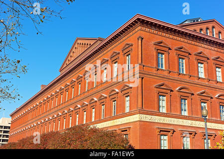 National Building Museum and deciduous trees in autumn foliage. Stock Photo