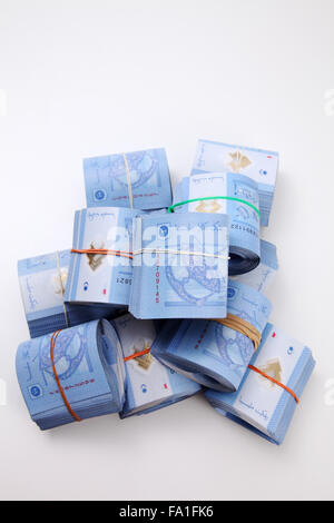 Malaysia Ringgit one Ringgit rolled up Stock Photo - Alamy
