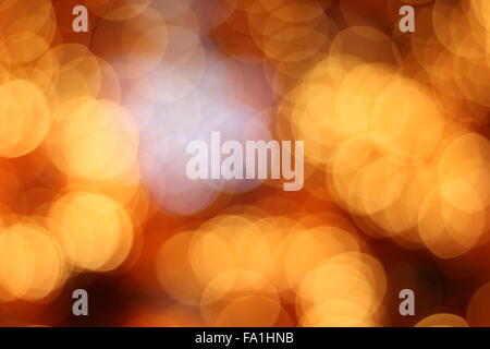 yellow and red blurred flickering Xmas lights Stock Photo