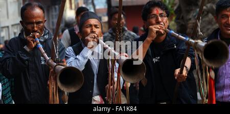 Kirtipur, Nepal. 19th Dec, 2015. Local devotees play the traditional musical instruments during Bishnu Devi Festival in Panga, Kirtipur, on the outskirts of Kathmandu, Nepal, Dec. 19, 2015. Bishnu Devi Festival is one of the important festivals of Panga. Devotees celebrate this festival by carrying the chariots of Bishnu Devi and Balkumari around the town. © Sunil Sharma/Xinhua/Alamy Live News Stock Photo
