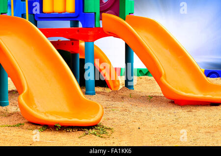 Children's slides of plastic isolated on blue white light Stock Photo