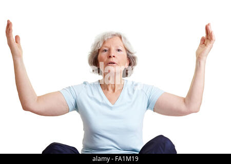 Relaxed senior woman doing some breathing exercises Stock Photo