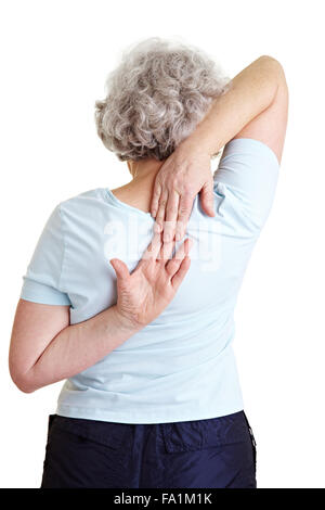 Elderly woman touching her hands behind her back Stock Photo