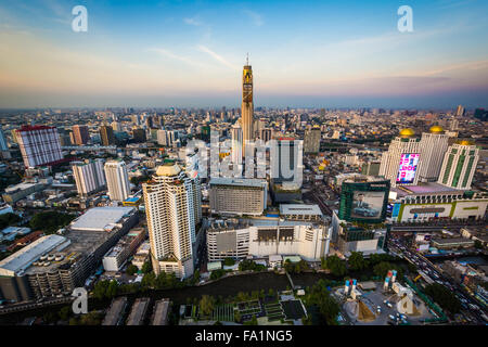 View of modern skyscrapers in Siam at sunset, in Bangkok, Thailand. Stock Photo
