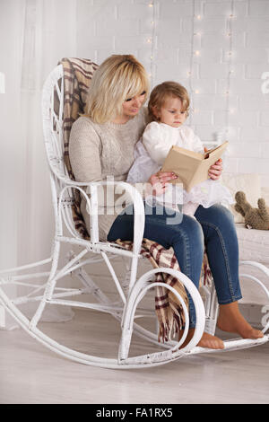 reading to her daughter Stock Photo