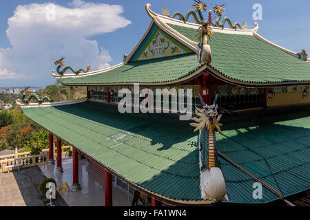 Decorative dragons on top of taoist temple in the Beverly Hills area of Cebu City in the Philippines Stock Photo