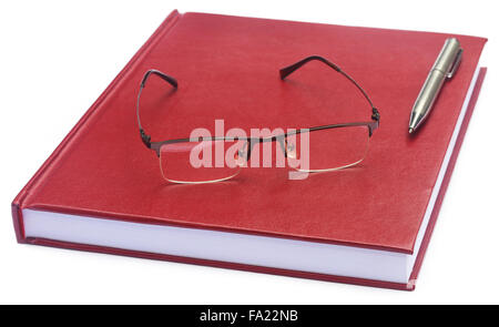 Maroon colored thesis paper with spectacles and pen Stock Photo