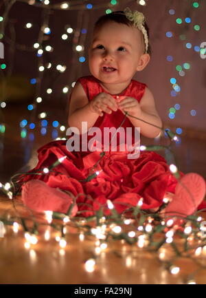 baby playing with led lights Stock Photo