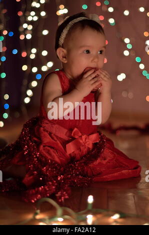 baby playing with led lights Stock Photo