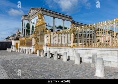 Golden gate of the Royal Chateau of Versailles near Paris, France Stock Photo