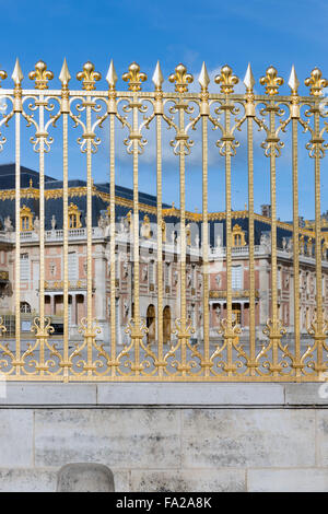 Golden gate of the Royal Chateau of Versailles near Paris, France Stock Photo