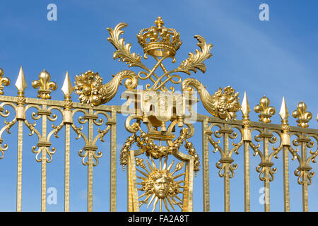 Golden gate with ornament of the Palace Versailles near Paris, France Stock Photo