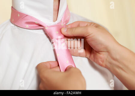 Clopse up picture of a groom getting ready Stock Photo