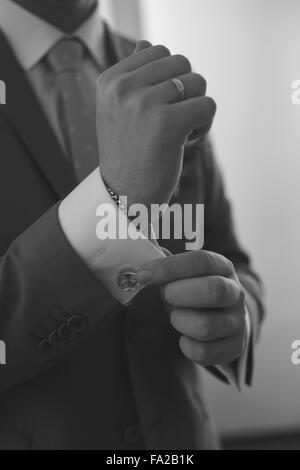 Clopse up picture of a groom getting ready Stock Photo