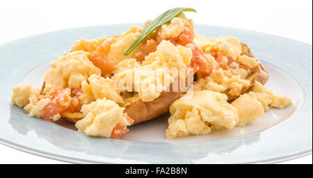 Scrambled eggs and smoked salmon on bagels Stock Photo
