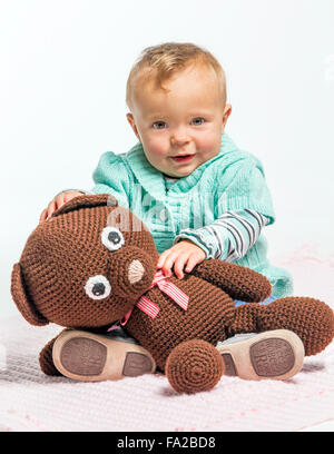 Studio photograph of cute one year old baby girl Stock Photo