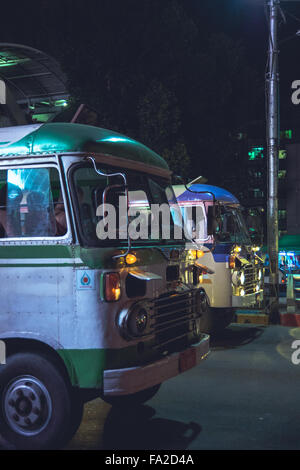 Vintage HIno buses still in operation as public transportaion in Yangon, Myanmar. Stock Photo