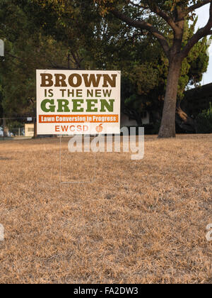 Brown is the New Green sign Stock Photo - Alamy