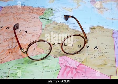 Glasses on a map - Libya Stock Photo