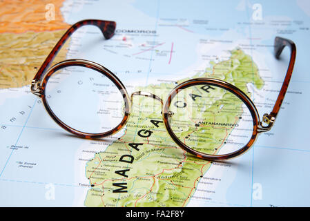 Glasses on a map - Antananarivo Stock Photo