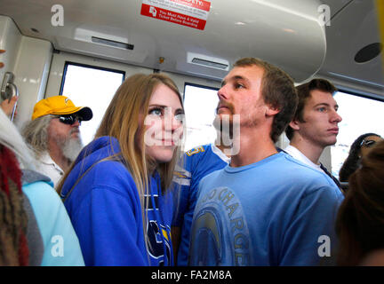 San Diego, CA, USA. 20th Dec, 2015. SAN DIEGO San Diego's last Chargers game at Qualcomm Stadium may have been played on Sunday December 20th 2015. Fans rode the trolley to get to the game. |Shea Walker, left and Wyatt Brakehbill, both from Carlsbad, took the trolley to the game and were a little melancholy with the possible loss of the team to Los Angeles.|John Gastaldo/San Diego Union-Tribune Credit:  John Gastaldo/U-T San Diego/ZUMA Wire/Alamy Live News Stock Photo