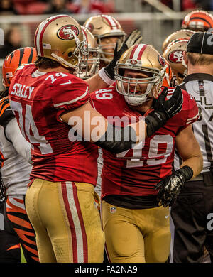 San Francisco 49ers' Bruce Miller (49), left, tackles Seattle Seahawks'  Byron Maxwell (41) after Maxwell's interception in the second half at  Candlestick Park in San Francisco on Sunday, Dec. 8, 2013. The