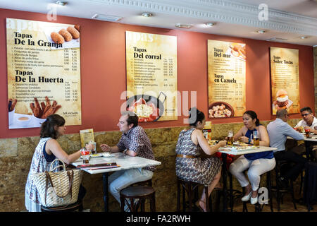 Madrid Spain,Hispanic Moncloa-Aravaca,Calle de la Princesa,tapas,restaurant restaurants food dining cafe cafes,interior inside,tables,menu,posters,man Stock Photo